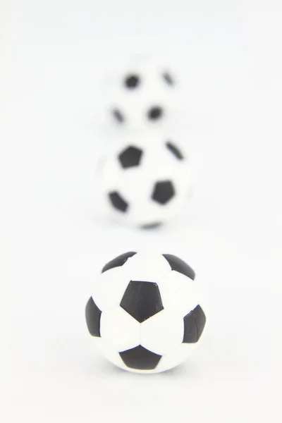 Tre palloni da calcio su sfondo bianco — Foto Stock