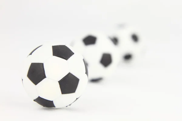 Three footballs on white background — Stock Photo, Image