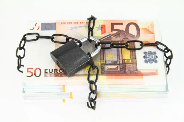 Locked money on white background — Stock Photo, Image