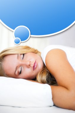 Portrait of young beautiful sleeping woman on bed at bedroom clipart