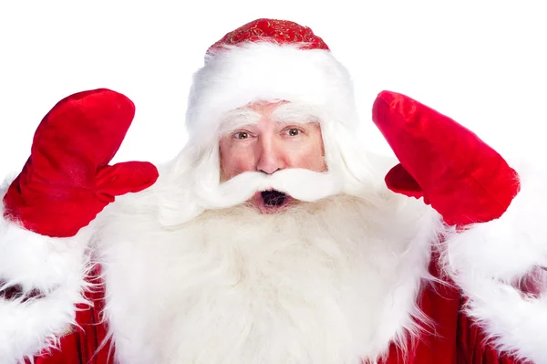 Kerstthema: Santa Claus buigen iets van zijn armen — Stockfoto