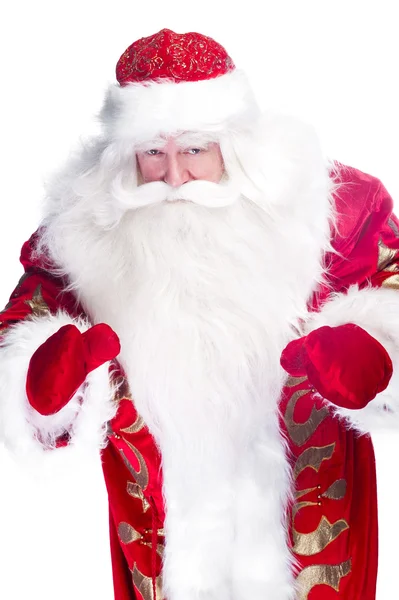 Tema de Natal: Papai Noel curvando algo de seus braços — Fotografia de Stock