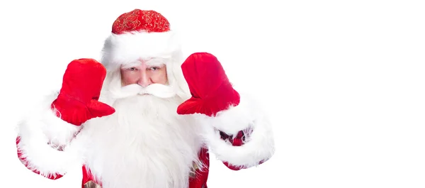 Рождественская тема: Санта-Клаус кланяется что-то из своих рук — стоковое фото