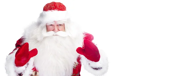 Weihnachtsthema: Weihnachtsmann beugt sich etwas aus den Armen — Stockfoto