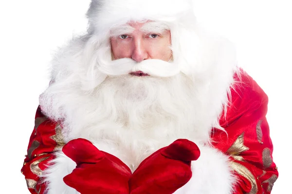 Рождественская тема: Санта-Клаус кланяется что-то из своих рук — стоковое фото