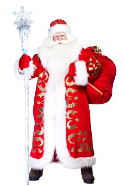 A traditional Christmas Santa Clause with staff isolated on whit clipart