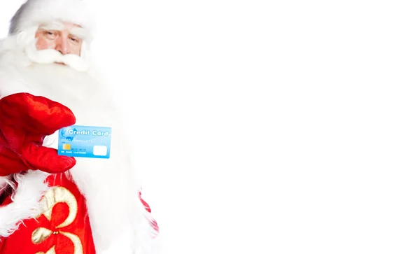 Traditionelle Weihnachtsmann halten und sät Kreditkarte, während giv — Stockfoto