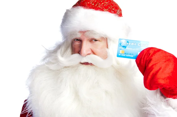 Traditionelle Weihnachtsmann halten und sät Kreditkarte, während giv — Stockfoto