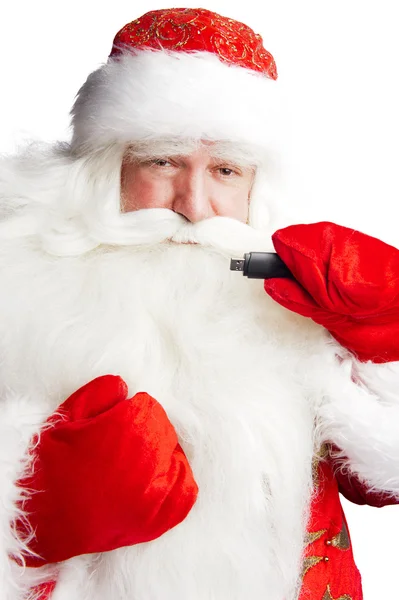 Traditionella jultomten med 3g USB-modem i armen på foreg — Stockfoto