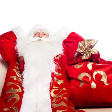kanepede kapalı dinlenme ve hayal kurmayı geleneksel Noel Baba.