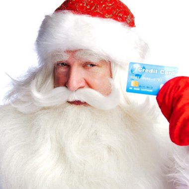 Traditional Santa Claus holding and sowing credit card while giv clipart