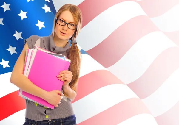 Retrato de una hermosa joven sosteniendo el libro en sus brazos. Estados Unidos Fla —  Fotos de Stock