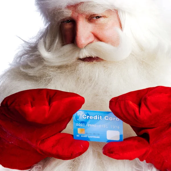 Traditionella jultomten anläggning och sådd kreditkort medan giv — Stockfoto