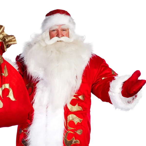 圣诞老人站起来与他的完整的包在白色背景上 — 图库照片