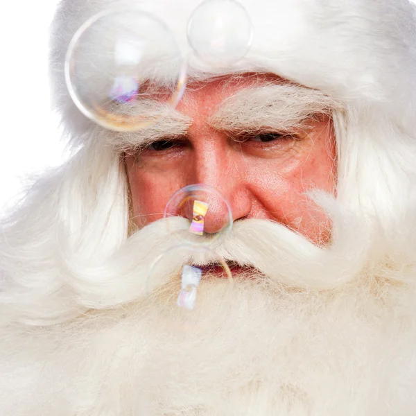 Jultomten porträtt leende isolerade över en vit bakgrund en — Stockfoto