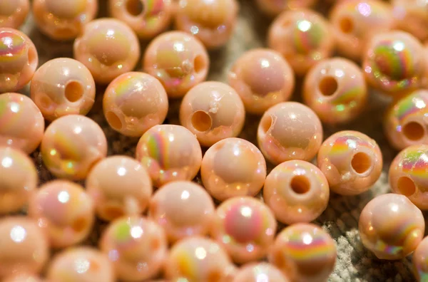 Beige färgade pärlor bakgrund — Stockfoto