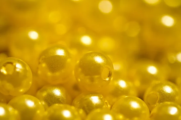 Gyllene gula pärlor abstrakt — Stockfoto