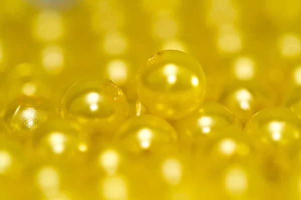 Gelbe Perlen schließen abstrakt — Stockfoto