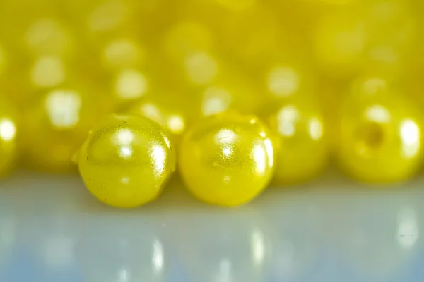 Yellow beads abstract background — Stock Photo, Image
