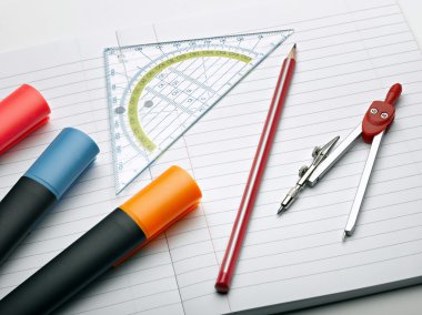 Writing tools and compass clipart