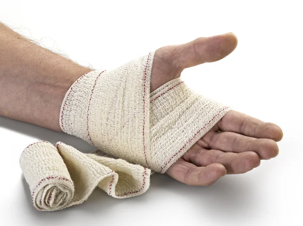 Medicin bandage på menneskelig hånd - Stock-foto