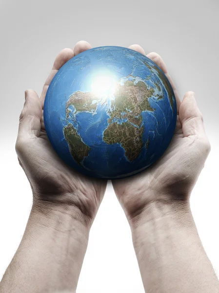 Male hand holding the Earth — Stock Photo, Image