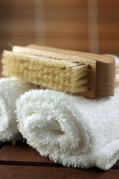 Spa. brush on the rolled towel — Stock Photo, Image