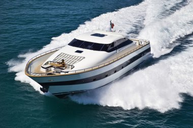 Italy, Tyrrhenian Sea, Tecnomar 26 luxury yacht, aerial view