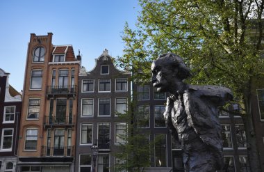 Holland, Amsterdam, the statue of Multatuli, famous dutch poet clipart