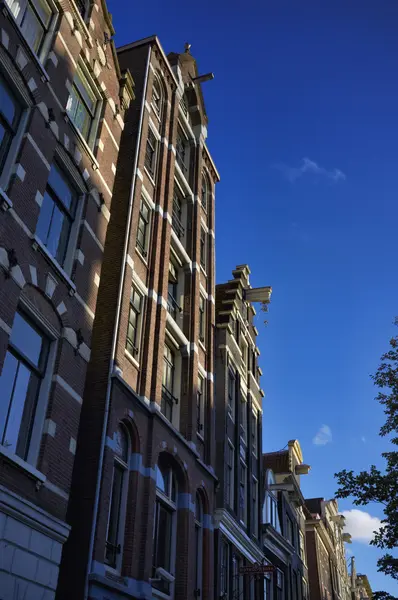 Olanda, Amsterdam, vecchie case private in pietra — Foto Stock
