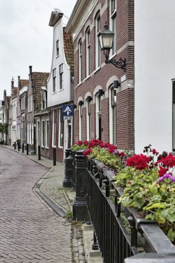 Holland, Volendam village (Amsterdam), typical dutch stone houses clipart