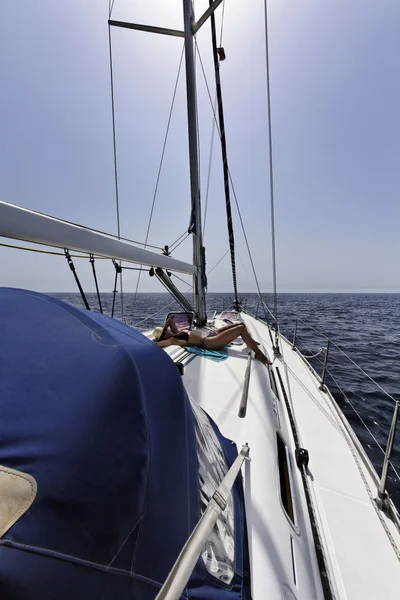 Mediterranean sea, Sicily Channel, woman on a sailing boat Stock Picture