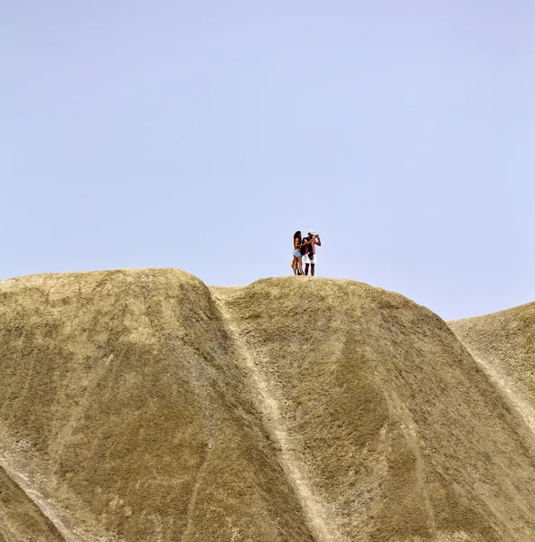 stock image Malta Island, tourists taking pictures from a cliff at Gnejna Bay