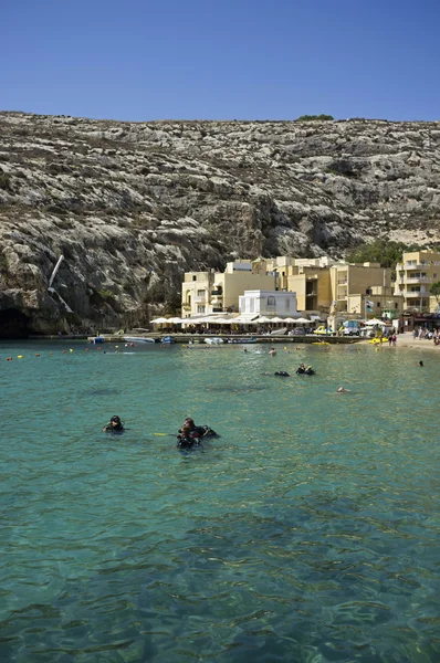 stock image Malta, Gozo Island, view of Xlendi bay with scuba divers