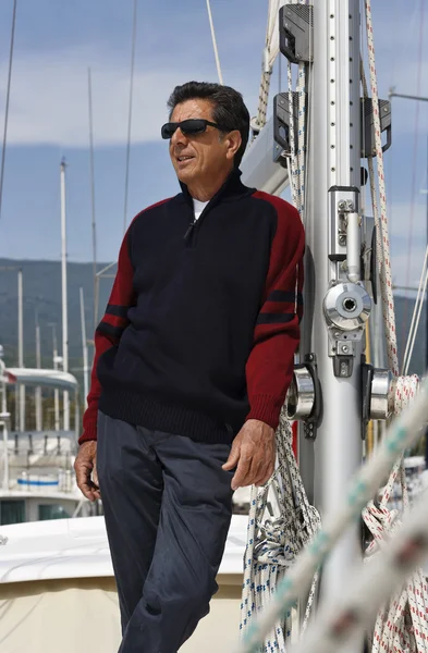 Italy, Tuscany, middle aged man on a sailing boat — Stock Photo, Image
