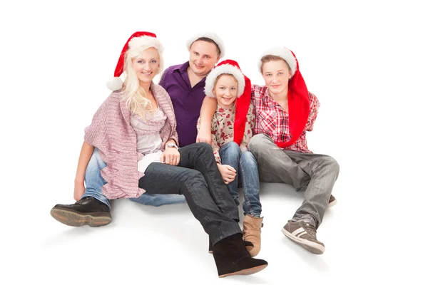 Feliz familia celebra la Navidad —  Fotos de Stock