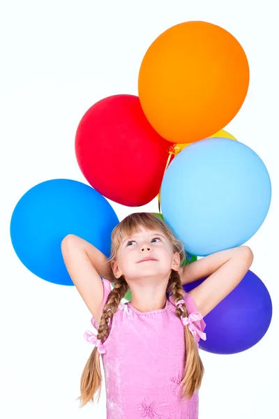 Sonriente chica sosteniendo globos rama aislada sobre fondo blanco — Foto de Stock