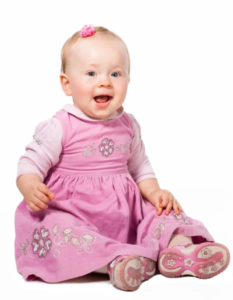 Happy infant girl sitting isolated on white background — Stock Photo, Image