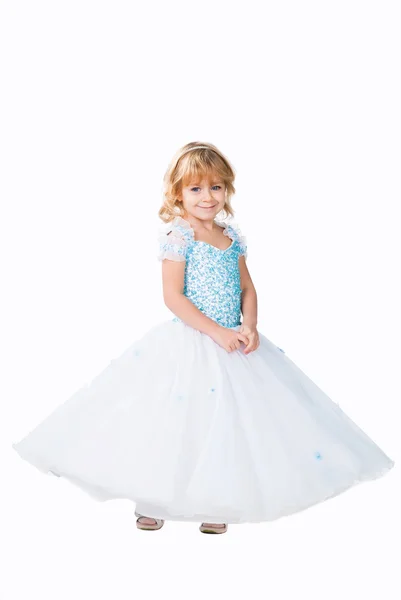 Fashionable little girl wearing gorgeous gown isolated on white studio back — Stock Photo, Image