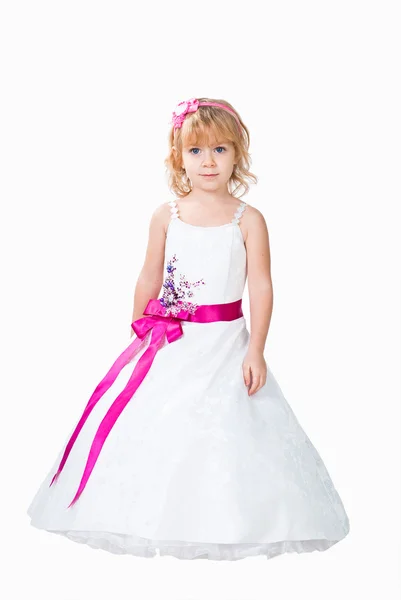 Fashionable little girl wearing gorgeous gown isolated on white studio back — Stock Photo, Image