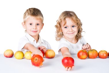 Two kids offering apples isolated on white clipart