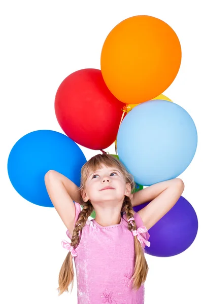 Rêver petite fille tenant des ballons tas isolé sur fond blanc — Photo