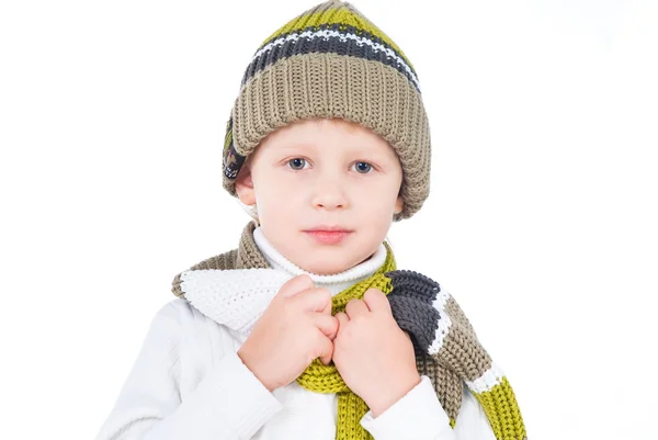 Niño vistiendo traje de invierno aislado sobre fondo blanco — Foto de Stock