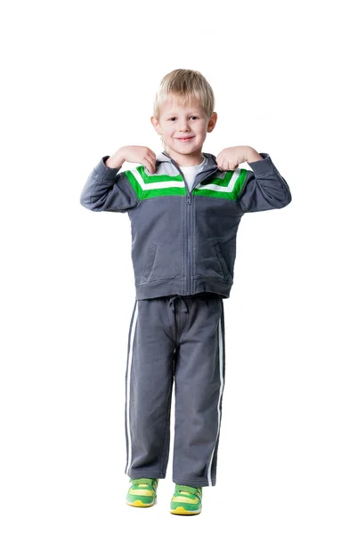 Little sportive boy making workout isolated on white background — Stock Photo, Image