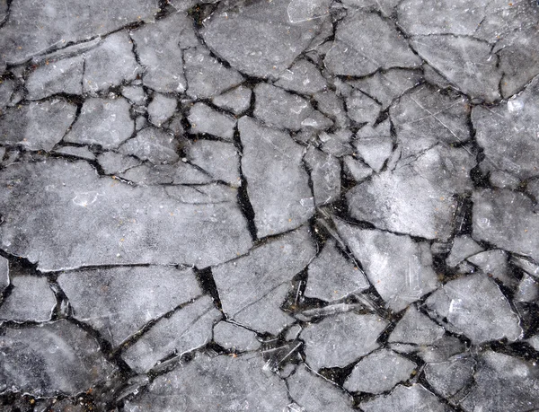 stock image Cracked Ice over Sidewalk Pavement Background