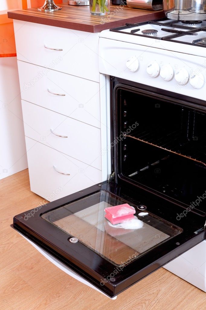 Dirty oven with sponge