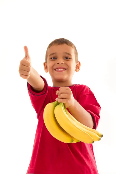 Ребёнок с бананом — стоковое фото