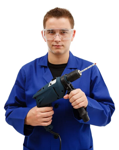 Joven trabajador sosteniendo la máquina de perforación —  Fotos de Stock
