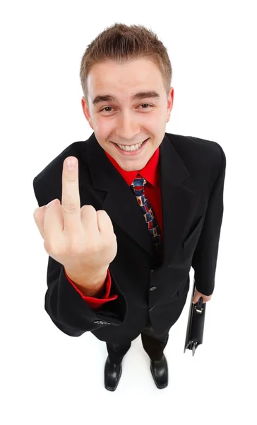Empresário cínico sorridente mostrando dedo médio — Fotografia de Stock