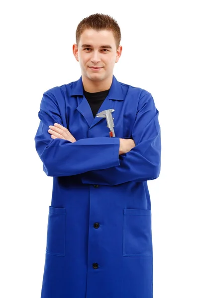 Confident young engineer with folded arms — Stock Photo, Image
